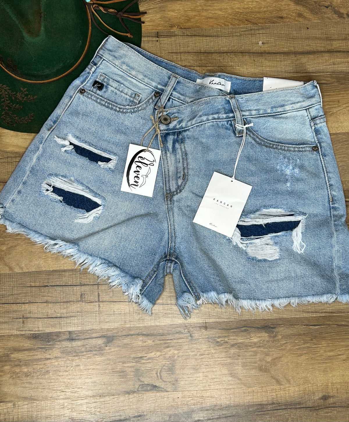 Flat Lay. Kan Can High Rise Crossover Shorts-29eleven | Women’s Fashion Boutique in Menan, Idaho