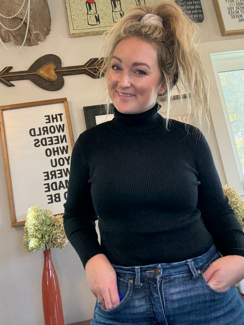Front View.  Black Ribbed Turtleneck Pullover. 29eleven | Women’s Fashion Boutique in Menan, Idaho