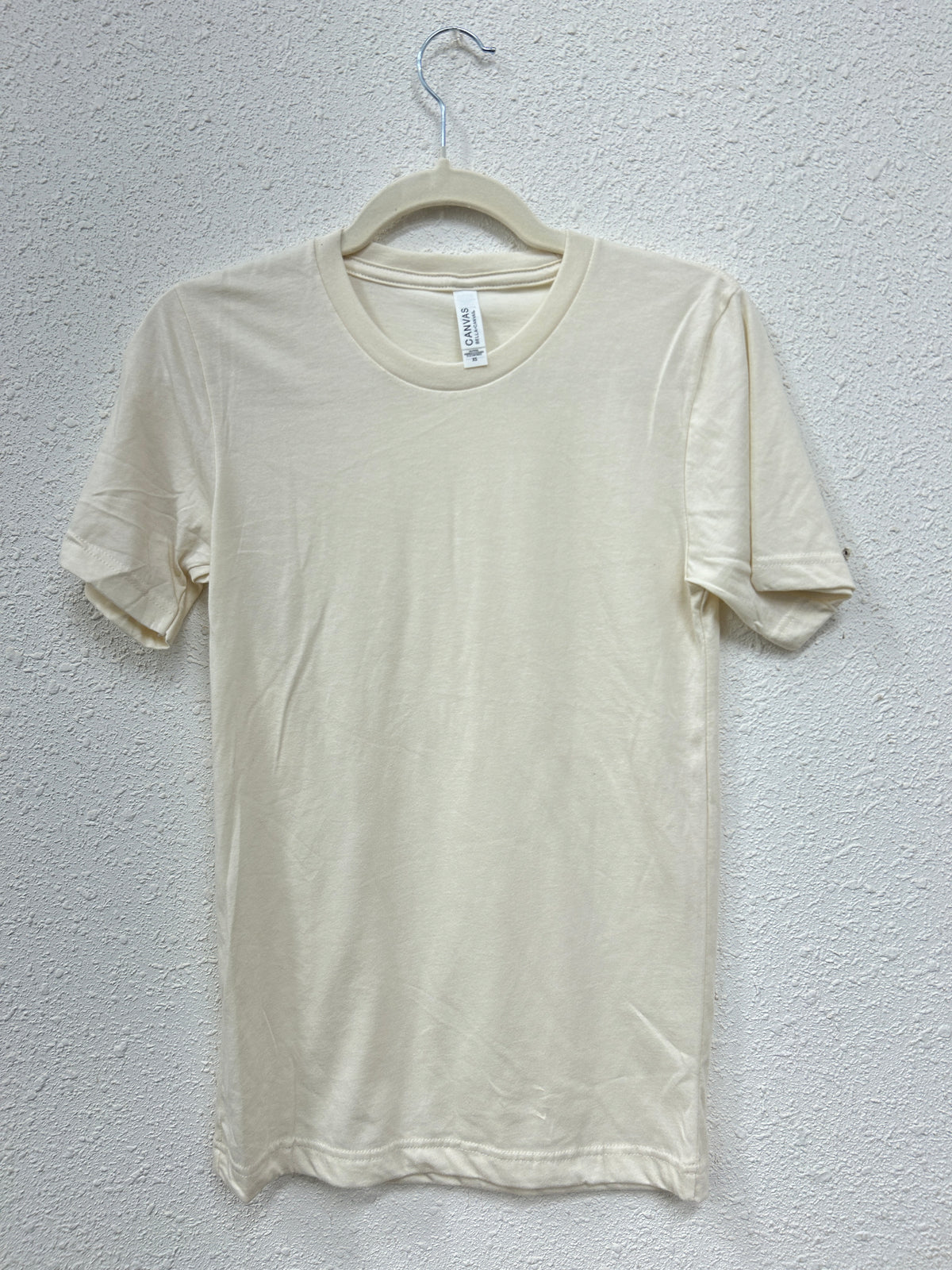 Front View. Cream Bella Canvas Tee-29eleven | Women’s Fashion Boutique in Menan, Idaho